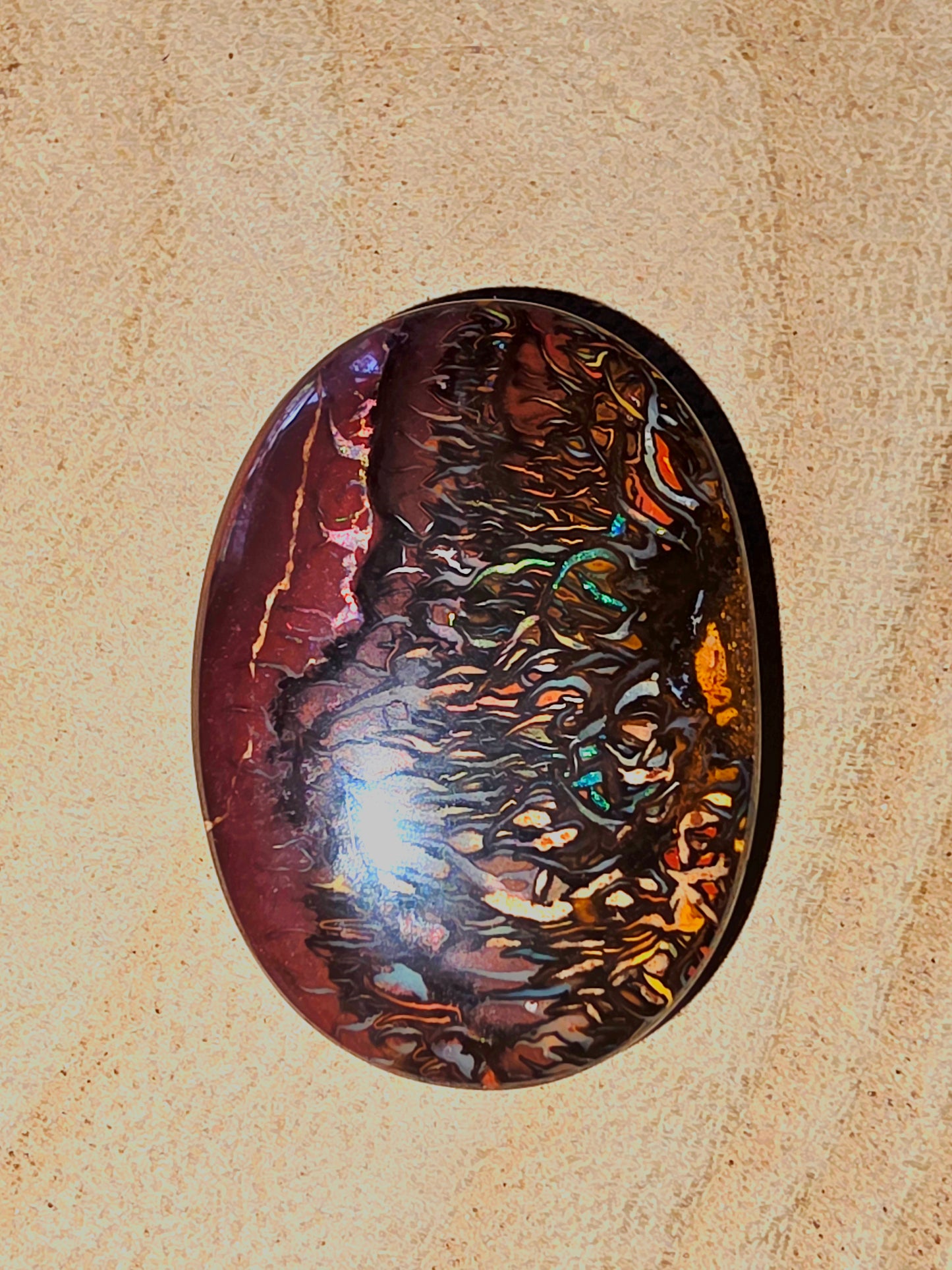 Oval Boulder Opal Cabochon with Blue & Green Pinfire