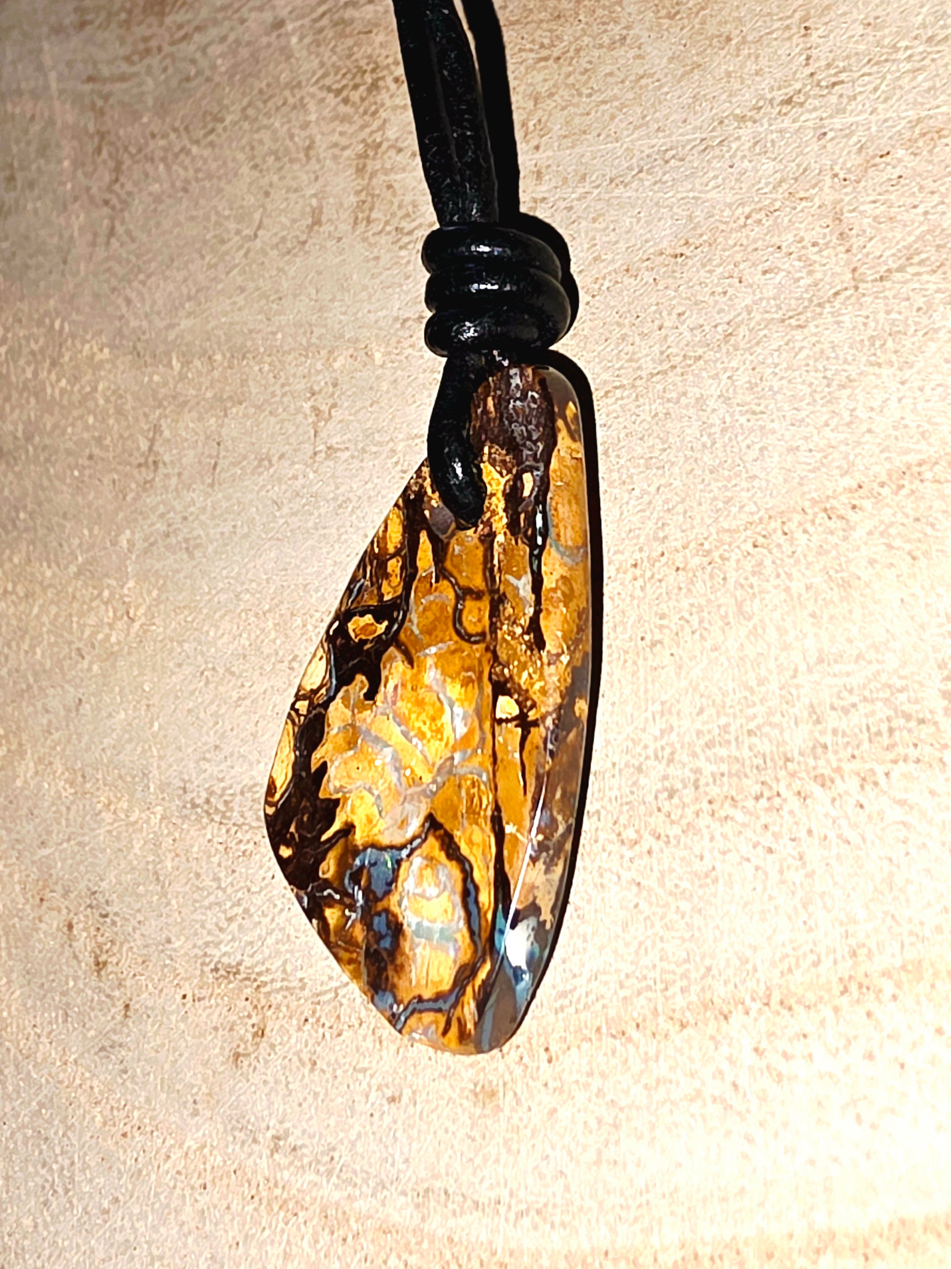 Pendant with a unique pattern on a beige background