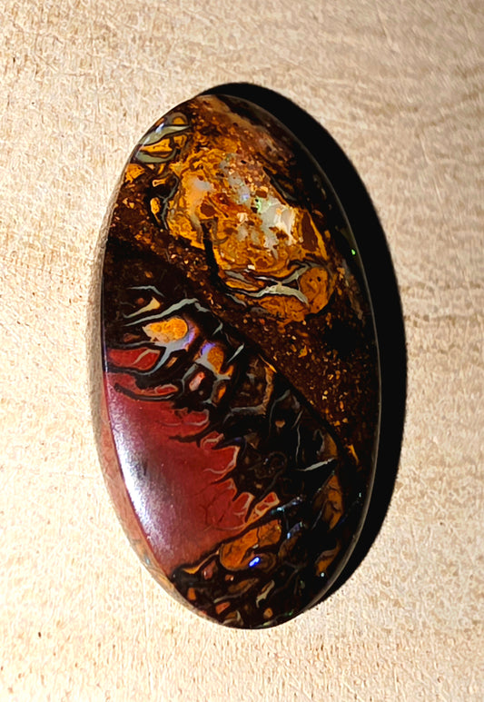 Solid Boulder Opal Cabochon – Blue Streaks & Soft Broad Flash