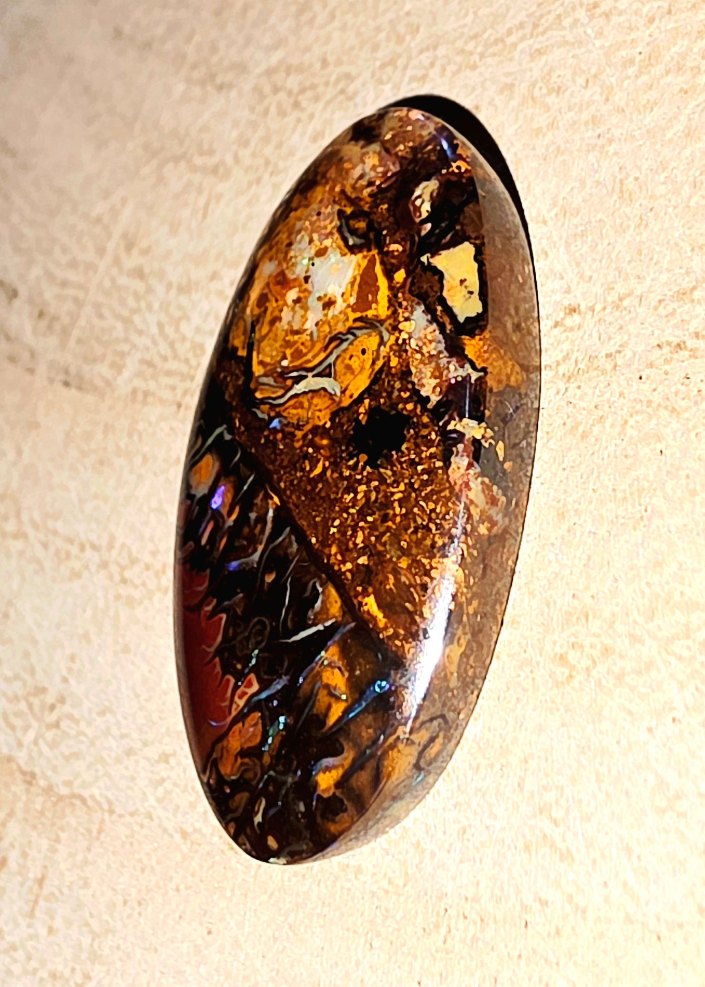 Solid Boulder Opal Cabochon – Blue Streaks & Soft Broad Flash