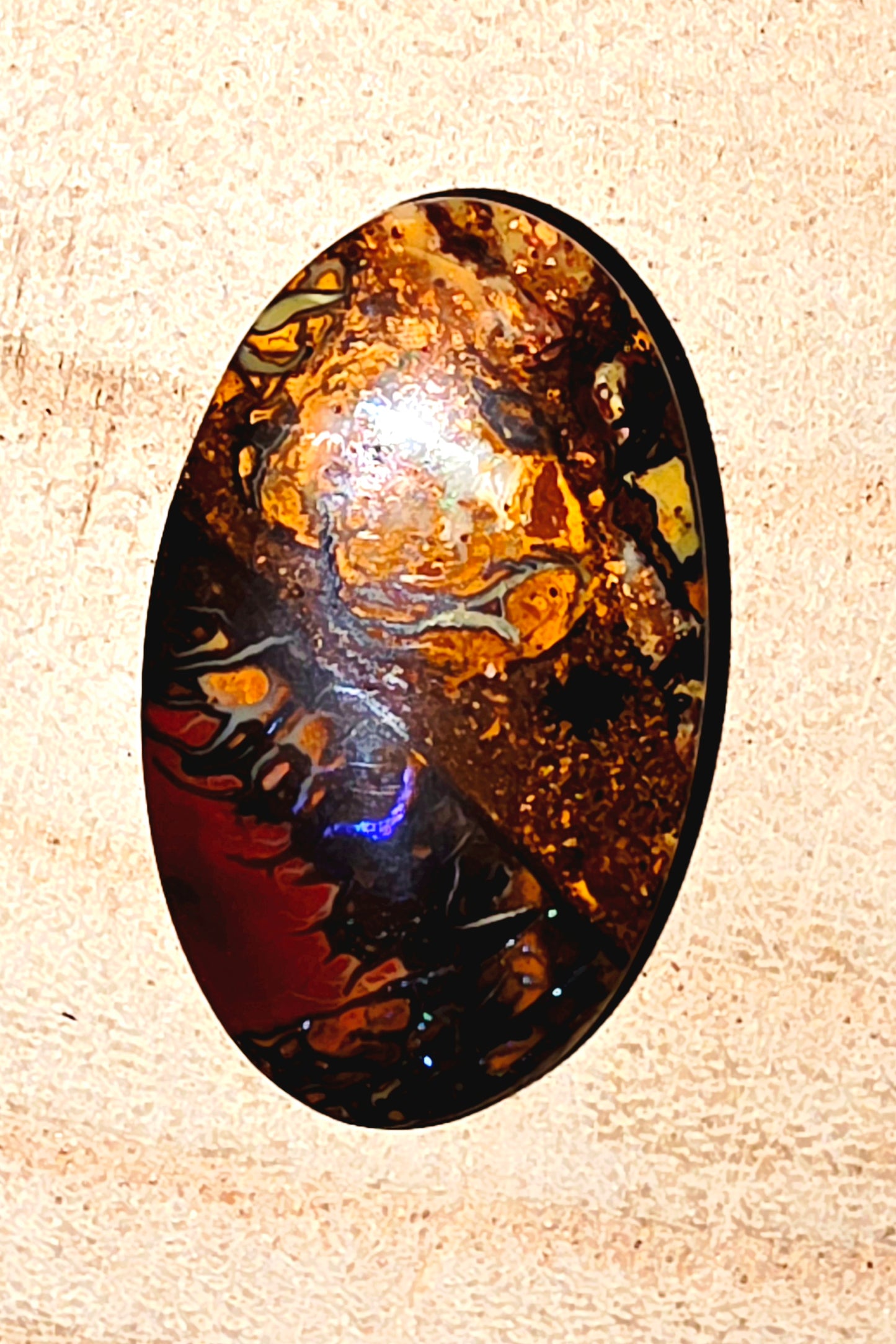Boulder Opal Cabochon – Blue Streaks & Soft Broad Flash