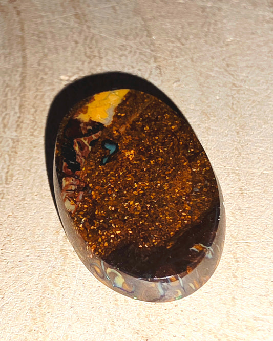 Solid Boulder Opal Cabochon – Blue Streaks & Soft Broad Flash