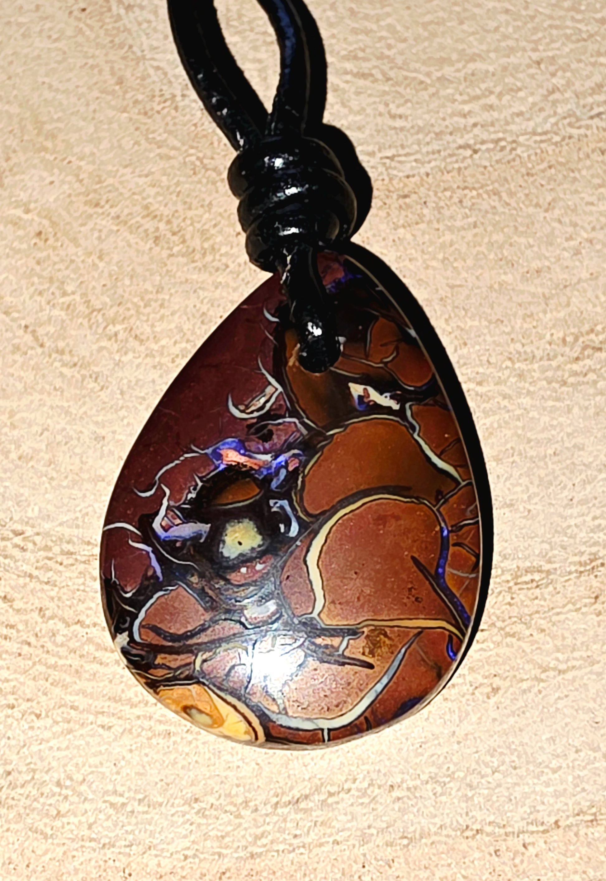 Teardrop Boulder Opal Necklace – Purple Tribal Pattern