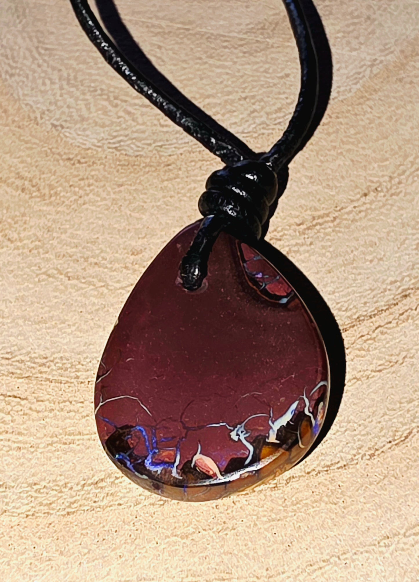 Reverse view, Teardrop Boulder Opal Necklace – Purple Tribal Pattern