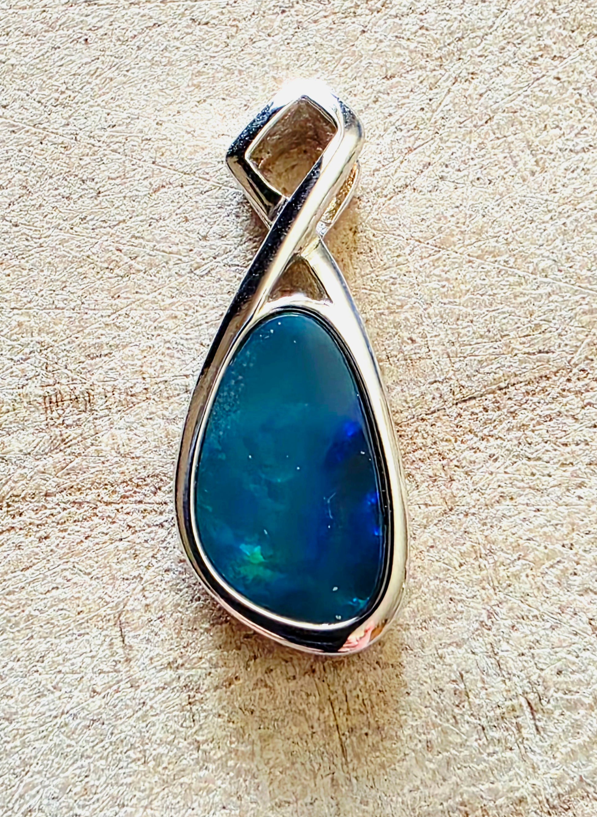 Boulder Opal Pendant - Electric Blue & Green Flash in Crossed 925 Silver Mount