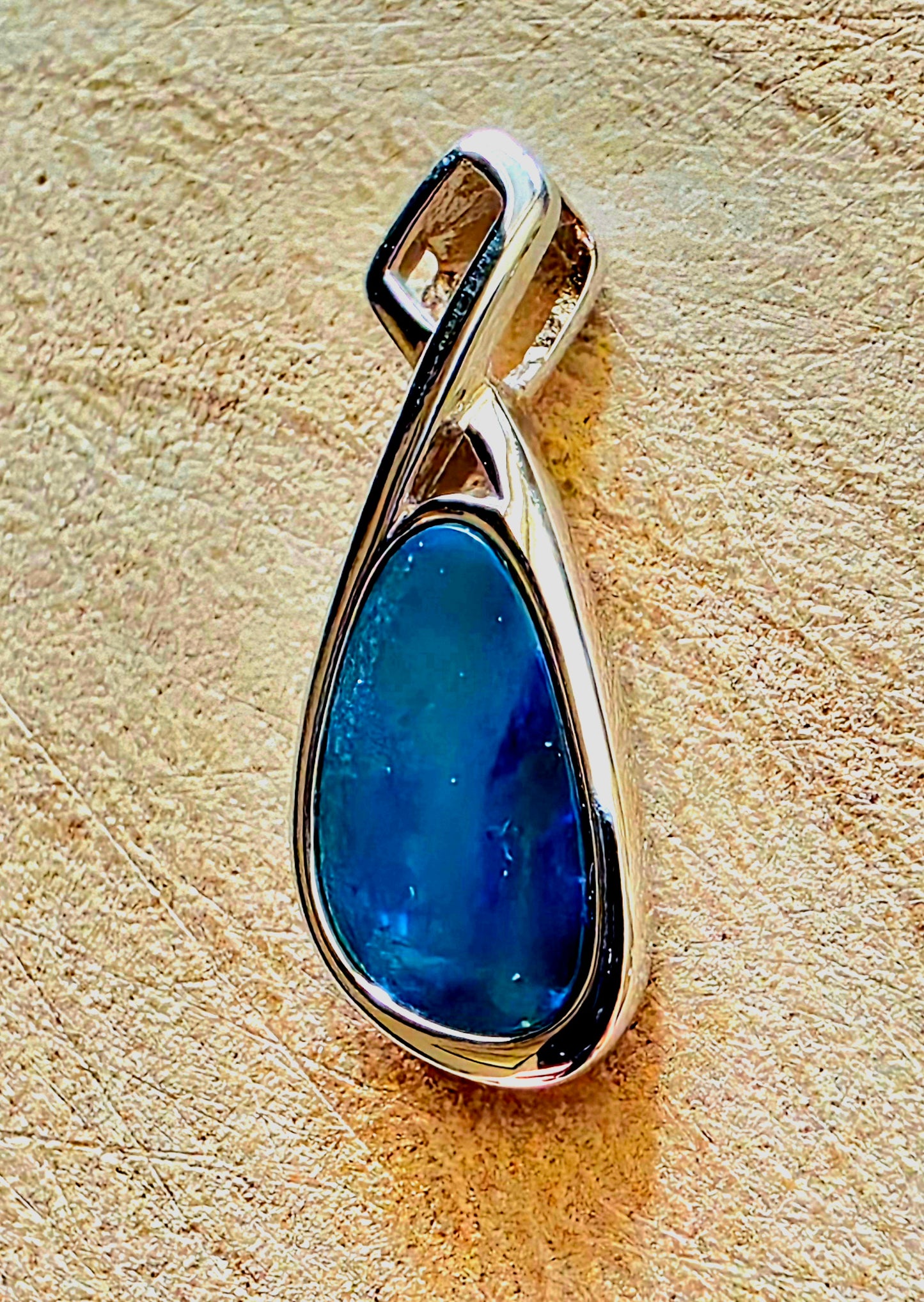 Boulder Opal Pendant - Electric Blue & Green Flash in Crossed 925 Silver Mount