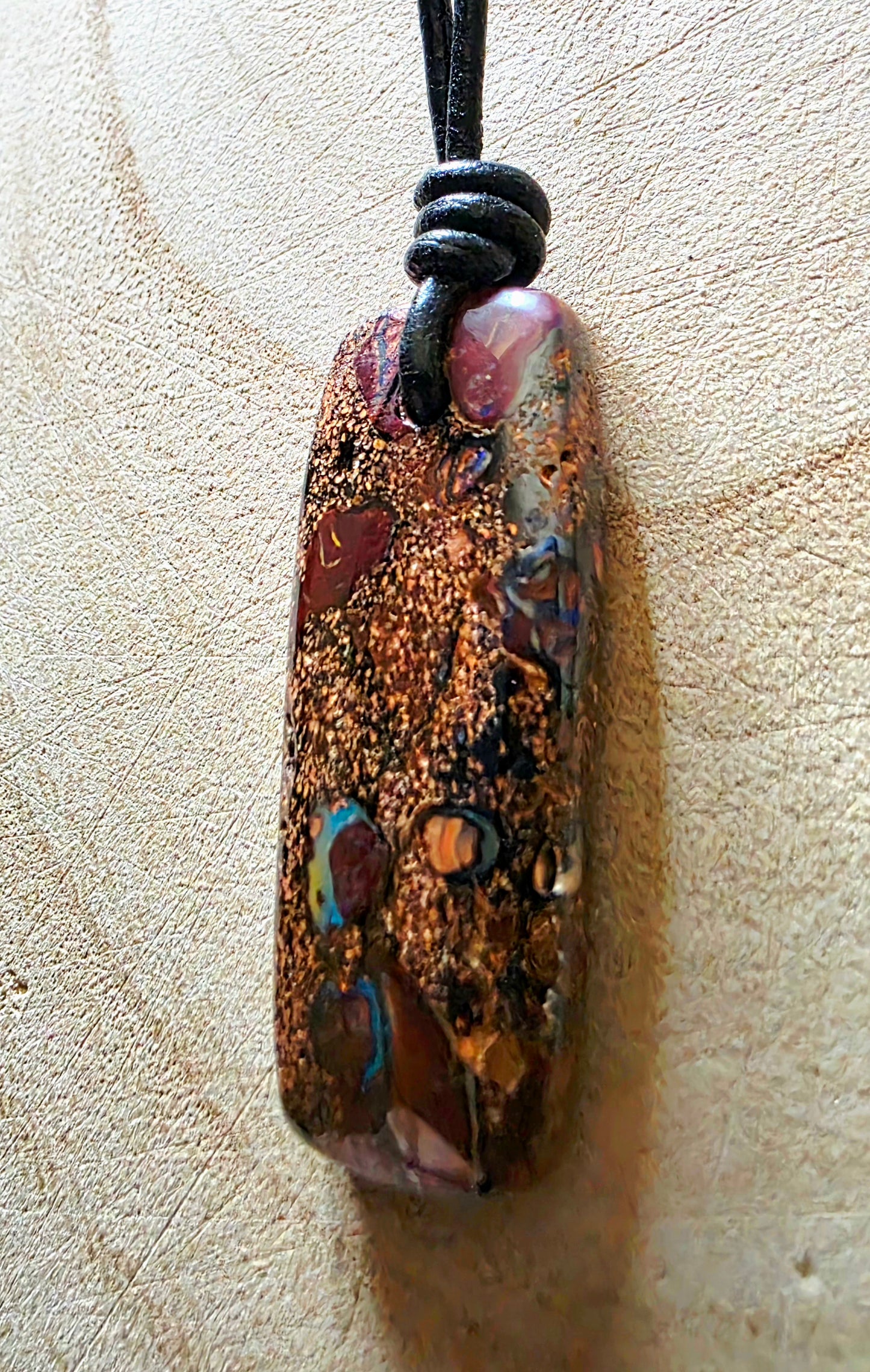 Boulder opal necklace on a leather cord