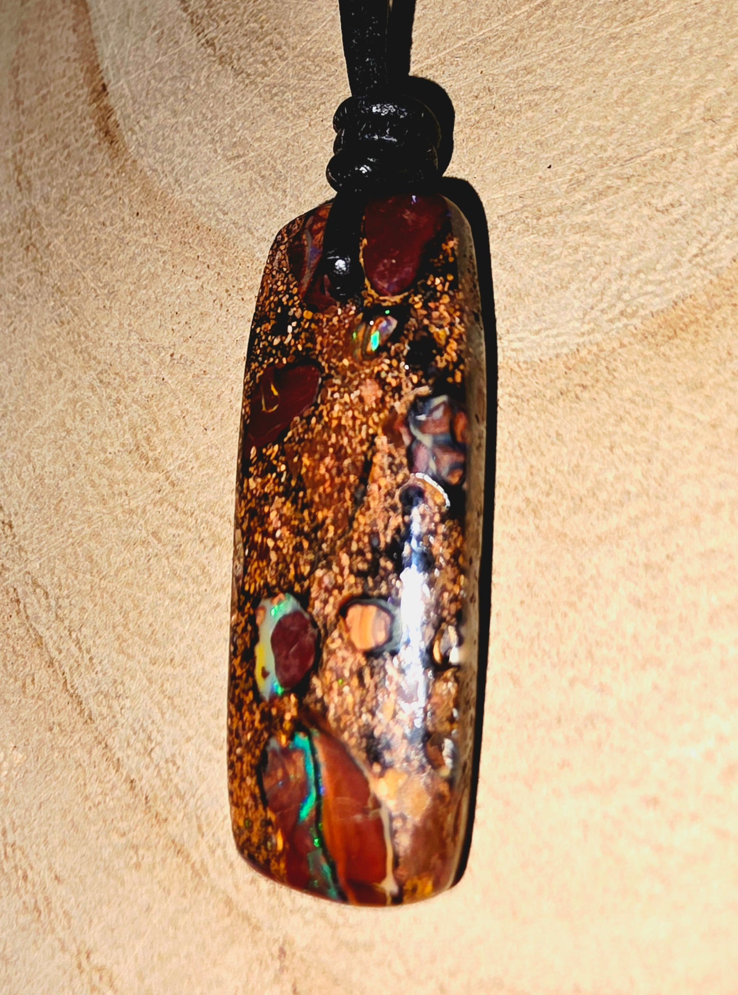 Boulder opal necklace on a leather cord