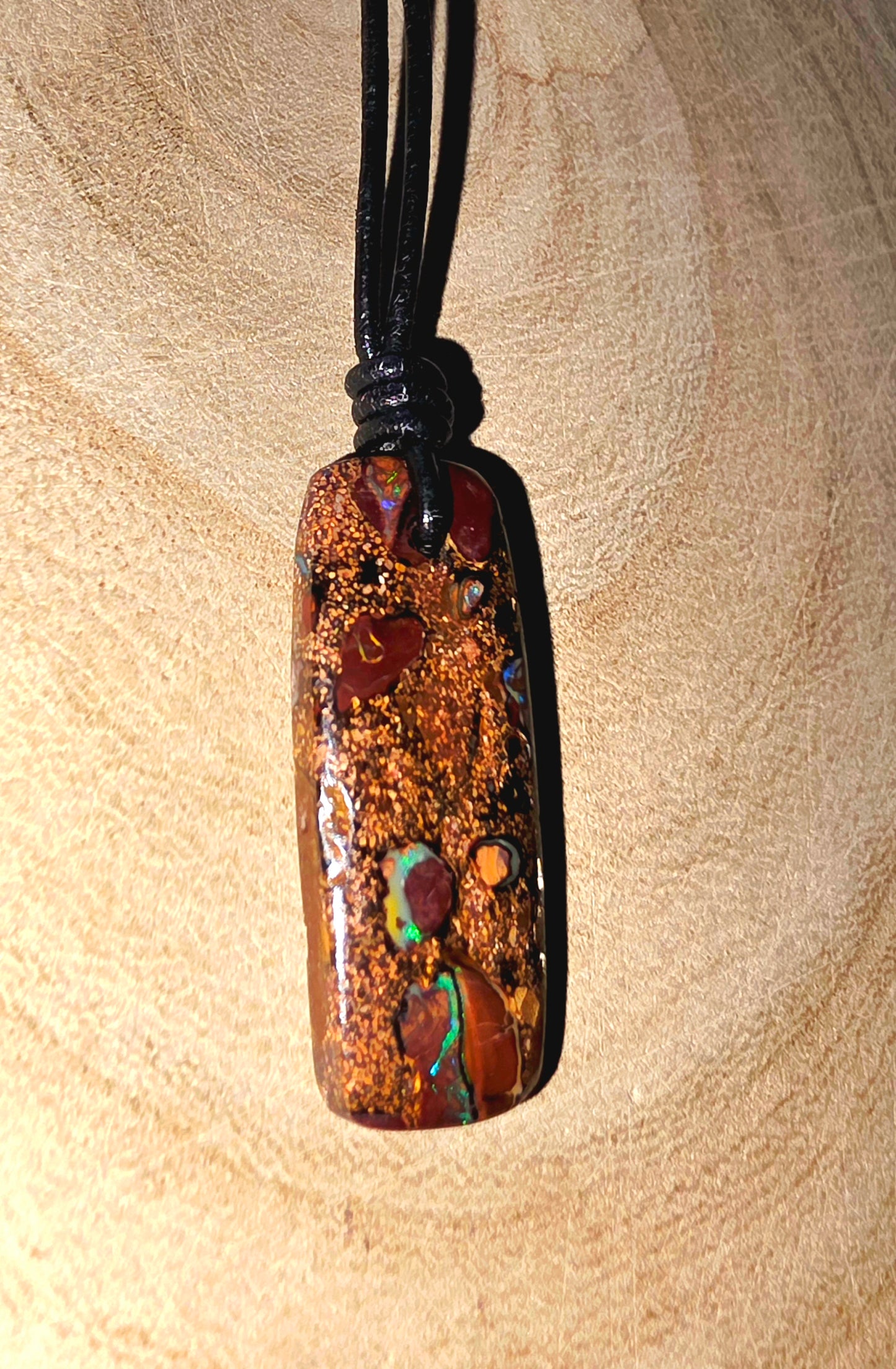 Boulder opal necklace on a leather cord