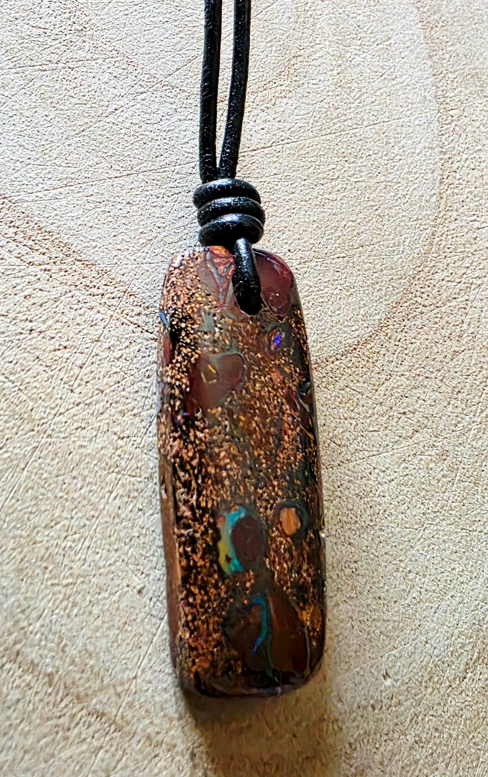Boulder opal necklace on a leather cord