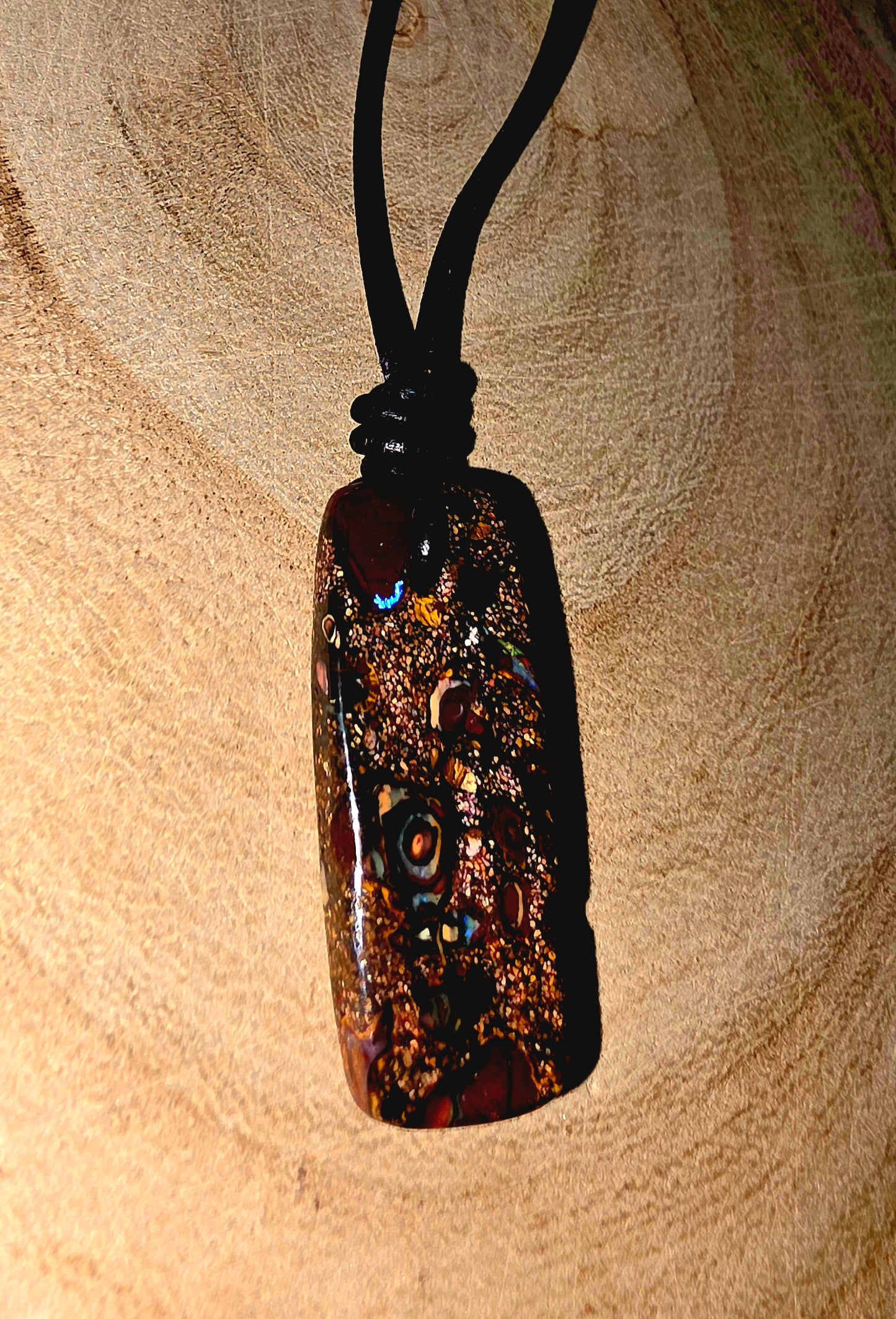 Boulder opal necklace on a leather cord