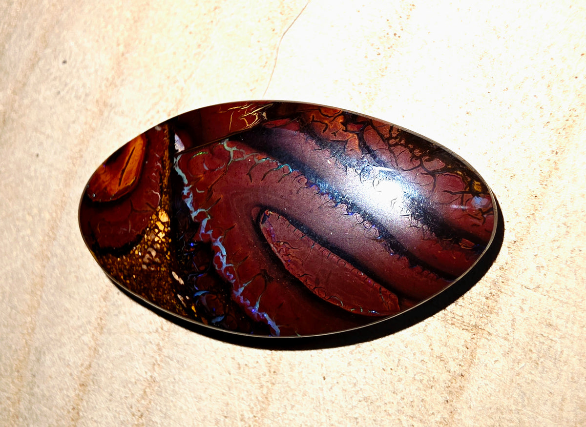 A large opal stone showing blue seams
