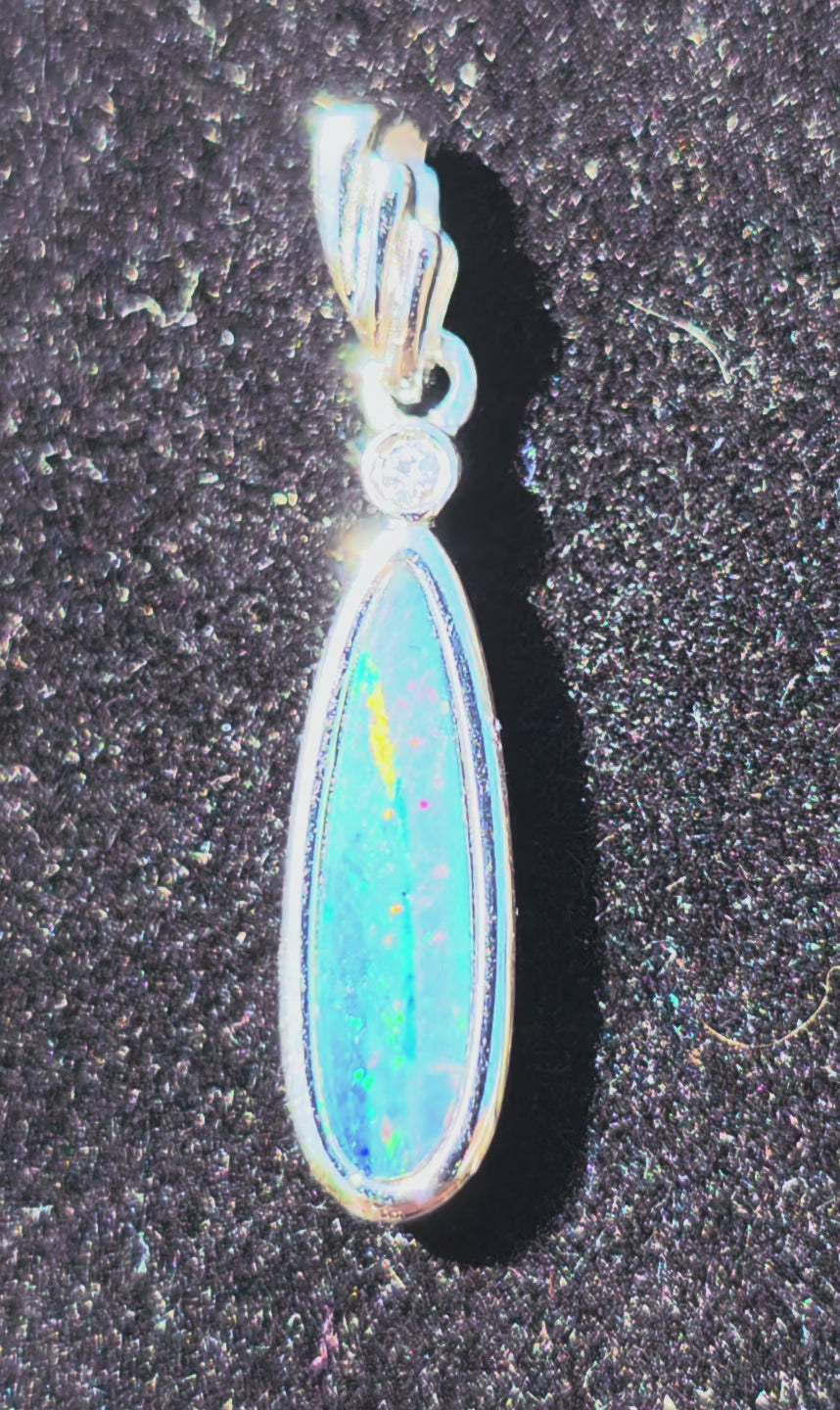 Boulder Opal Pendant - Blue‑Green Rolling Flash with Centre Stripe 925 Silver