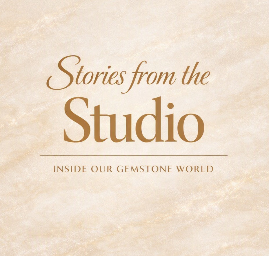 A square graphic with a warm beige marble-like background and centered brown text reading 'Stories from the Studio' and 'INSIDE OUR GEMSTONE WORLD'.